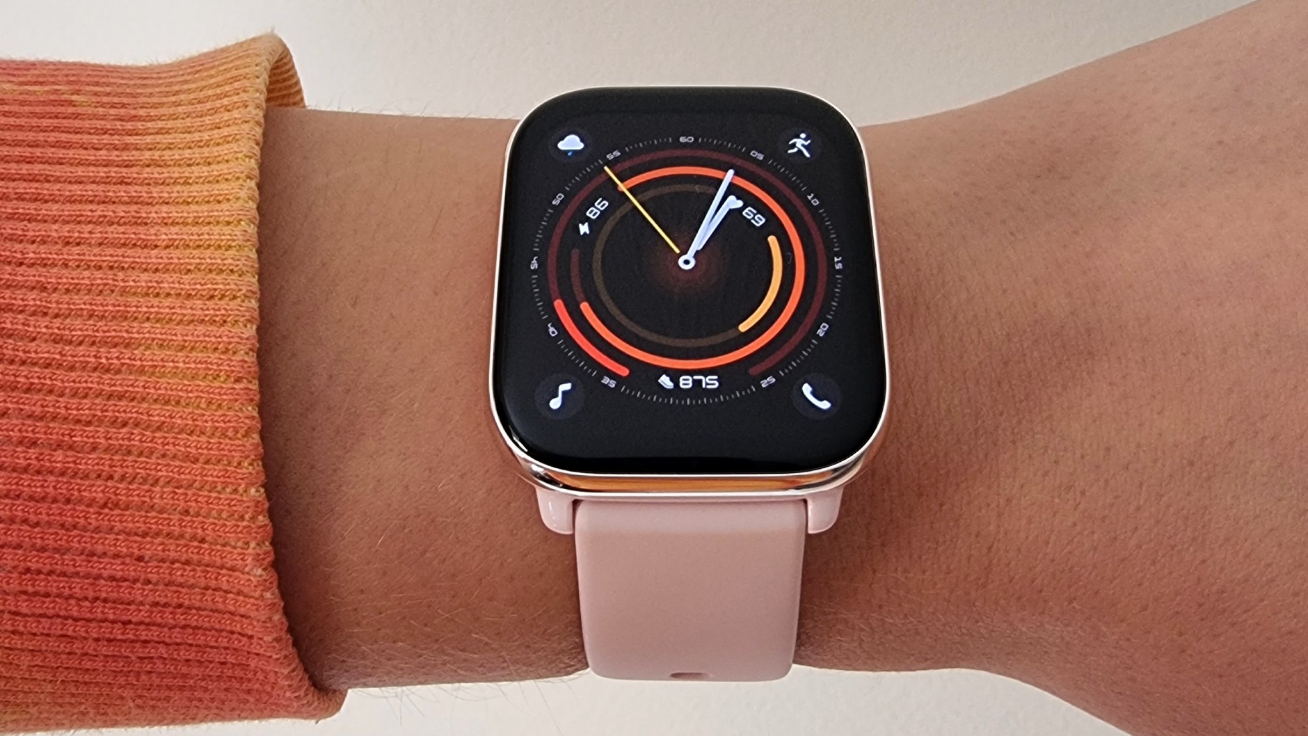Our reviewer wearing the Amazfit Active showing the bright display.